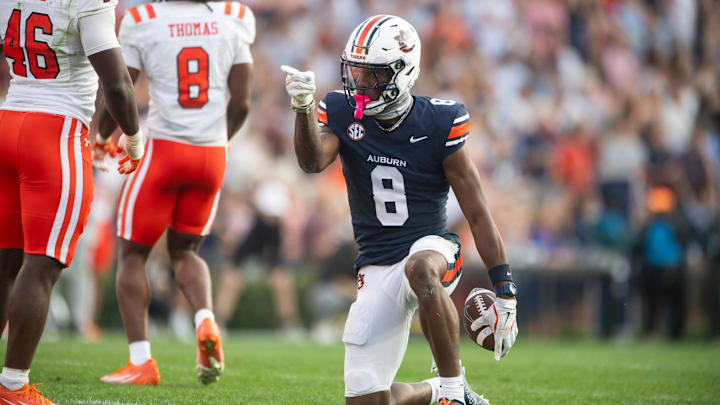 Auburn Tigers wide receiver Cam Coleman (8) celebrates a first down as Auburn Tigers take on Mercer Bears at Jordan-Hare Stadium in Auburn, Ala. on Saturday, Nov. 22, 2025. Auburn Tigers defeated the Mercer Bears 62-17.