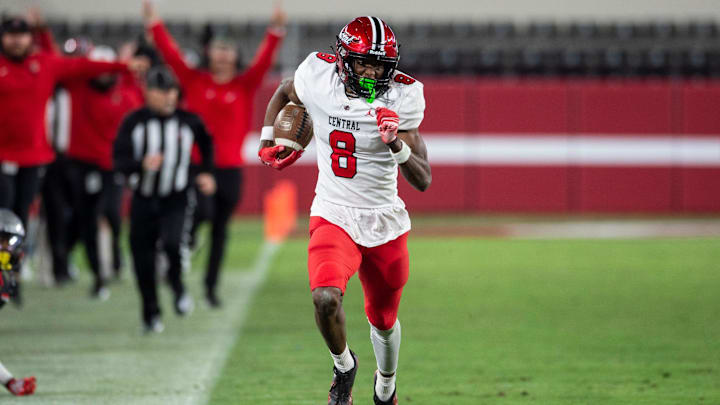 Central Phenix City's Cameron Coleman (8) breaks free for a touchdown after a catch as Central Phenix City faces Thompson in the Class 7A football state championship at Bryant-Denny Stadium in Tuscaloosa, Ala., on Wednesday, Dec. 6, 2023. Central Phenix City defeated Thompson 21-19. Central Phenix City's Cameron Coleman (8) breaks free for a touchdown after a catch as Central Phenix City faces Thompson in the Class 7A football state championship at Bryant-Denny Stadium in Tuscaloosa, Ala., on Wednesday, Dec. 6, 2023. Central Phenix City defeated Thompson 21-19.