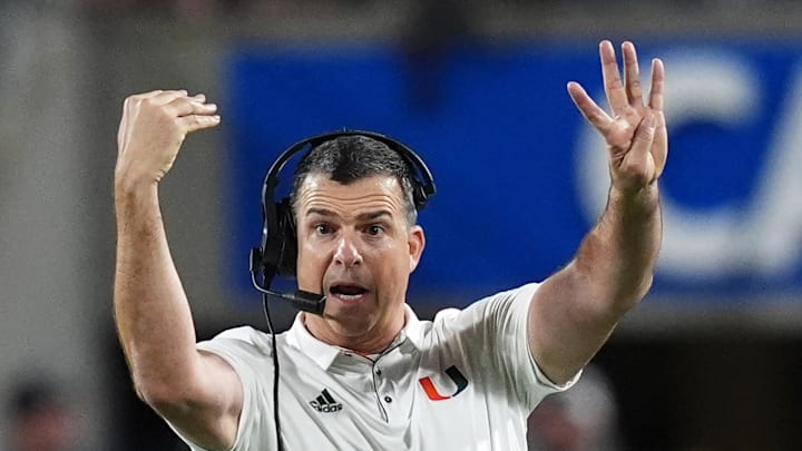 Dec 28, 2024; Orlando, FL, USA; Miami Hurricanes head coach Mario Cristobal reacts during the second half against the Iowa State Cyclones at Camping World Stadium. Mandatory Credit: Jasen Vinlove-Imagn Images