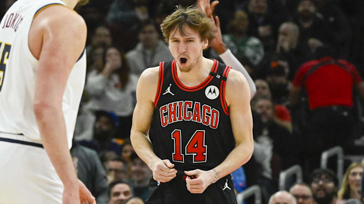 Jan 27, 2025; Chicago, Illinois, USA; Chicago Bulls forward Matas Buzelis (14) reacts after a dunk against the Denver Nuggets during the second half at the United Center. Mandatory Credit: Matt Marton-Imagn Images