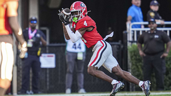 Oct 12, 2024; Athens, Georgia, USA; Georgia Bulldogs defensive back KJ Bolden (4) intercepts a pass against the Mississippi State Bulldogs at Sanford Stadium. Mandatory Credit: Dale Zanine-Imagn Images Oct 12, 2024; Athens, Georgia, USA; Georgia Bulldogs defensive back KJ Bolden (4) intercepts a pass against the Mississippi State Bulldogs at Sanford Stadium. Mandatory Credit: Dale Zanine-Imagn Images