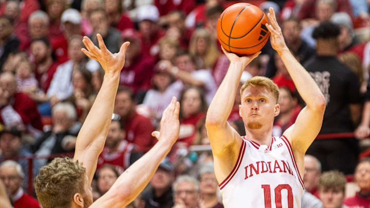 Indiana's Luke Goode (10) shoots over Purdue's Caleb Furst (1) at Simon Skjodt Assembly Hall. Indiana's Luke Goode (10) shoots over Purdue's Caleb Furst (1) at Simon Skjodt Assembly Hall.