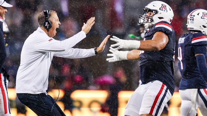 Oct 11, 2025; Tucson, Arizona, USA; Arizona Wildcats head coach Brent Brennan celebrates a blocked field goal during the second quarter of the game against the Brigham Young Cougars at Arizona Stadium. Mandatory Credit: Aryanna Frank-Imagn Images Oct 11, 2025; Tucson, Arizona, USA; Arizona Wildcats head coach Brent Brennan celebrates a blocked field goal during the second quarter of the game against the Brigham Young Cougars at Arizona Stadium. Mandatory Credit: Aryanna Frank-Imagn Images