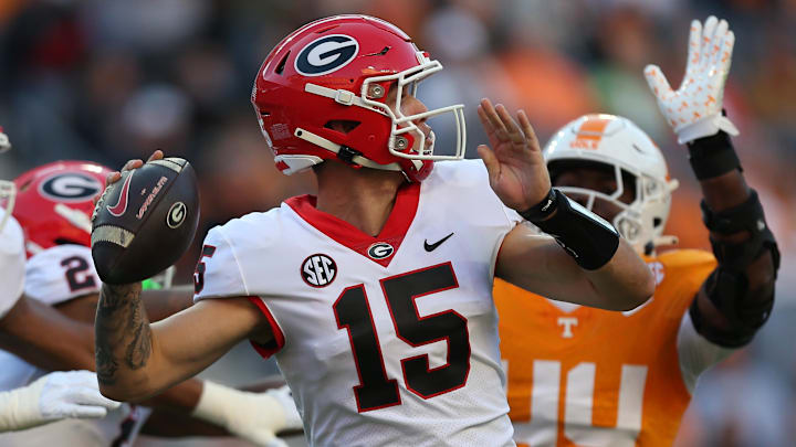 Nov 18, 2023; Knoxville, Tennessee, USA; Georgia Bulldogs quarterback Carson Beck (15) passes the
