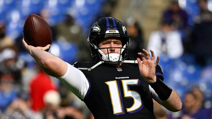 Oct 26, 2025; Baltimore, Maryland, USA;  Baltimore Ravens quarterback Cooper Rush (15) warms up before the game against the Chicago Bears at M&T Bank Stadium. 