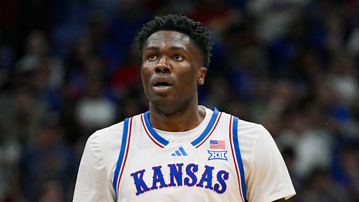 Dec 31, 2024; Lawrence, Kansas, USA; Kansas Jayhawks forward Flory Bidunga (40) reacts during the second half against the West Virginia Mountaineers at Allen Fieldhouse. Mandatory Credit: Jay Biggerstaff-Imagn Images Dec 31, 2024; Lawrence, Kansas, USA; Kansas Jayhawks forward Flory Bidunga (40) reacts during the second half against the West Virginia Mountaineers at Allen Fieldhouse. Mandatory Credit: Jay Biggerstaff-Imagn Images