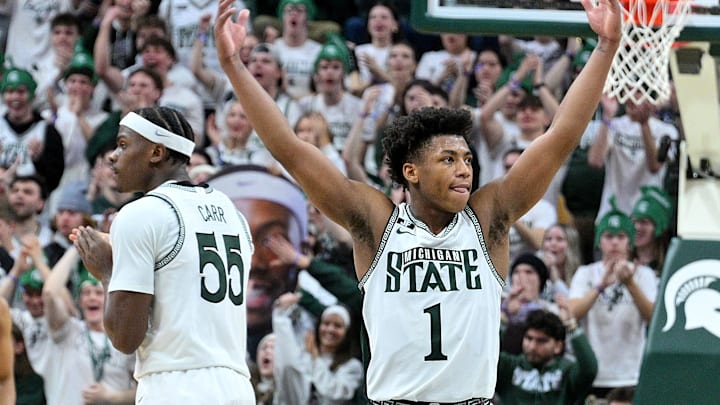 Jan 19, 2025; East Lansing, Michigan, USA;  Michigan State Spartans guard Jeremy Fears Jr. (1) urges the crowd to get loud during the second half against the Illinois Fighting Illini at Jack Breslin Student Events Center. Mandatory Credit: Dale Young-Imagn Images