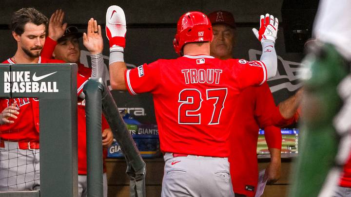 Sep 22, 2026; West Sacramento, California, USA; Los Angeles Angels center fielder Mike Trout (27) celebrates with team mates after scoring against the Athletics during the first inning at Sutter Health Park. Mandatory Credit: Ed Szczepanski-Imagn Images Sep 22, 2026; West Sacramento, California, USA; Los Angeles Angels center fielder Mike Trout (27) celebrates with team mates after scoring against the Athletics during the first inning at Sutter Health Park. Mandatory Credit: Ed Szczepanski-Imagn Images