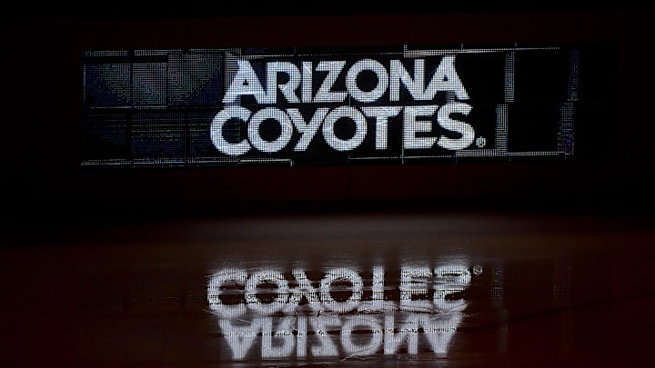 Oct 14, 2017; Glendale, AZ, USA; The Arizona Coyotes logo is reflected on the ice prior to the game