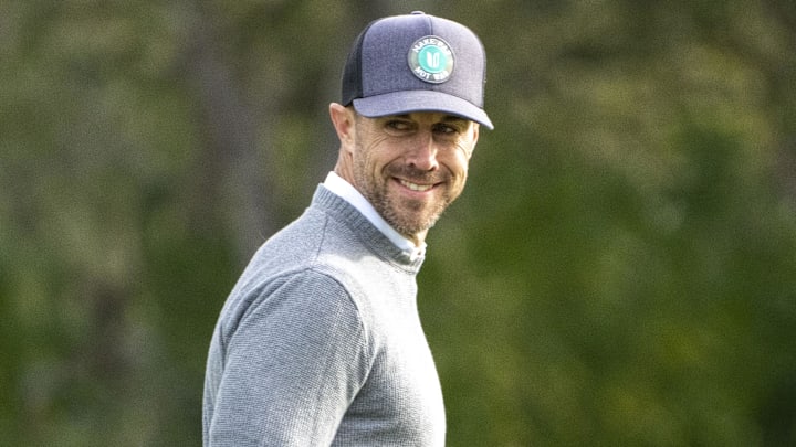 February 2, 2023; Pebble Beach, California, USA; Alex Smith smiles on the first hole during the first round of the AT&T Pebble Beach Pro-Am golf tournament at Pebble Beach Golf Links. Mandatory Credit: Kyle Terada-Imagn Images