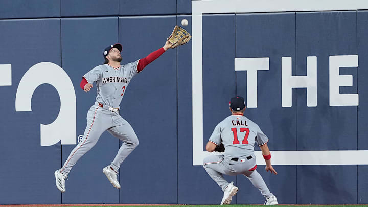 Apr 2, 2025; Toronto, Ontario, CAN; Washington Nationals center fielder Dylan Crews (3) attempts to catch a fly ball against the Toronto Blue Jays during the second inning at Rogers Centre.