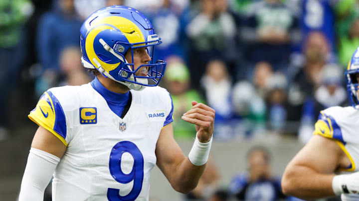 Nov 3, 2024; Seattle, Washington, USA; Los Angeles Rams quarterback Matthew Stafford (9) reacts after throwing an incompletion against the Seattle Seahawks during the first quarter at Lumen Field. Mandatory Credit: Joe Nicholson-Imagn Images