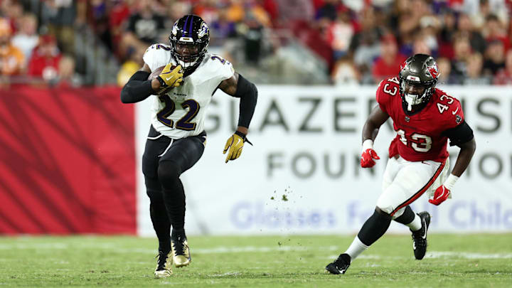 Baltimore Ravens running back Derrick Henry (22) runs with the ball against the Tampa Bay Buccaneers. Baltimore Ravens running back Derrick Henry (22) runs with the ball against the Tampa Bay Buccaneers.