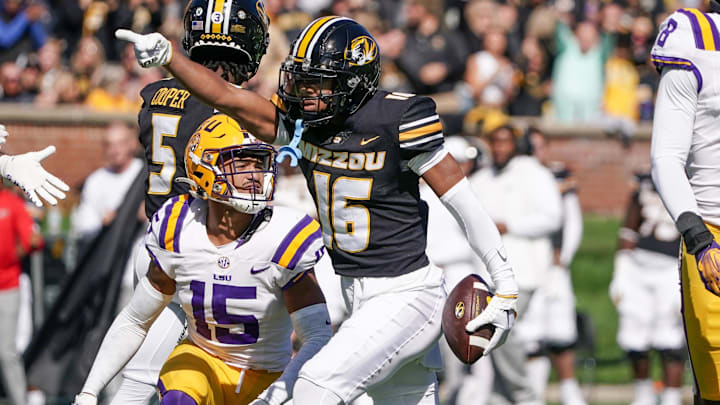 Oct 7, 2023; Columbia, Missouri, USA; Missouri Tigers wide receiver Daniel Blood (16) celebrates after a play against the LSU Tigers during the first half at Faurot Field at Memorial Stadium. Mandatory Credit: Denny Medley-Imagn Images