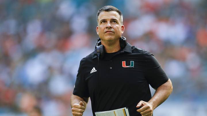 Oct 22, 2022; Miami Gardens, Florida, USA; Miami Hurricanes head coach Mario Cristobal runs on the field during the third quarter against the Duke Blue Devils at Hard Rock Stadium. Mandatory Credit: Sam Navarro-Imagn Images