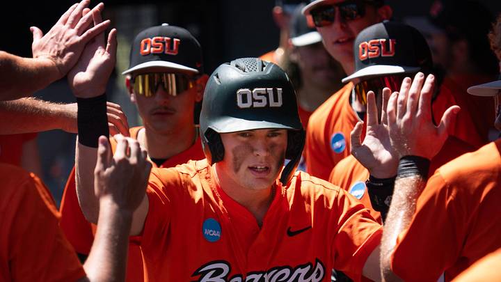 Oregon State’s Ethan Porter, center, is congratulated by teams after scoring a run in the fourth inning against Washington State on day three at the NCAA Eugene Regional Tournament at PK Park n Eugene May 31, 2026. Oregon State’s Ethan Porter, center, is congratulated by teams after scoring a run in the fourth inning against Washington State on day three at the NCAA Eugene Regional Tournament at PK Park n Eugene May 31, 2026.