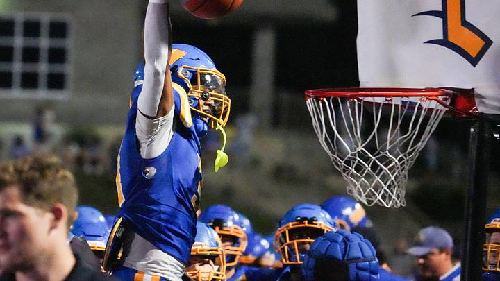 Westview's Miles Brown (3) dunks a basketball after coming down with the touchdown reception during a TSSAA Football match between Lausanne Collegiate versus Westview in Martin, Tenn., on Friday, Sep 26, 2025.