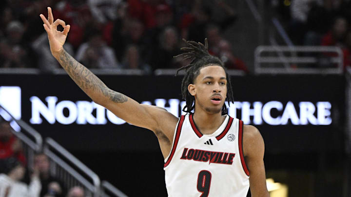 Jan 7, 2025; Louisville, Kentucky, USA; Louisville Cardinals forward Khani Rooths (9) celebrates after making a three point shot during the second half against the Clemson Tigers at KFC Yum! Center. Louisville defeated Clemson 74-64. 
