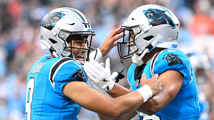 Bryce Young (left) looks more comfortable going into Year 3, especially due to a deeper supporting cast at the skill positions.