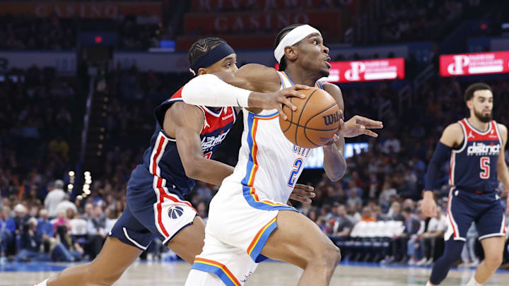 Feb 23, 2024; Oklahoma City, Oklahoma, USA; Oklahoma City Thunder guard Shai Gilgeous-Alexander (2) drives to the basket against the Washington Wizards during the second half at Paycom Center. Mandatory Credit: Alonzo Adams-Imagn Images