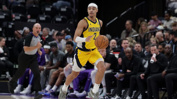 Feb 3, 2025; Salt Lake City, Utah, USA;  Indiana Pacers guard Andrew Nembhard (2) brings the ball up the court during the second half against the Utah Jazz at Delta Center. Mandatory Credit: Chris Nicoll-Imagn Images