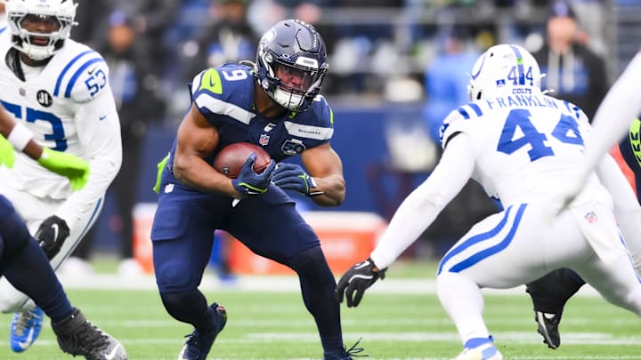 Dec 14, 2025; Seattle, Washington, USA; Seattle Seahawks running back Kenneth Walker III (9) rushes against the Indianapolis Colts during the third quarter at Lumen Field. Mandatory Credit: Steven Bisig-Imagn Images Dec 14, 2025; Seattle, Washington, USA; Seattle Seahawks running back Kenneth Walker III (9) rushes against the Indianapolis Colts during the third quarter at Lumen Field. Mandatory Credit: Steven Bisig-Imagn Images