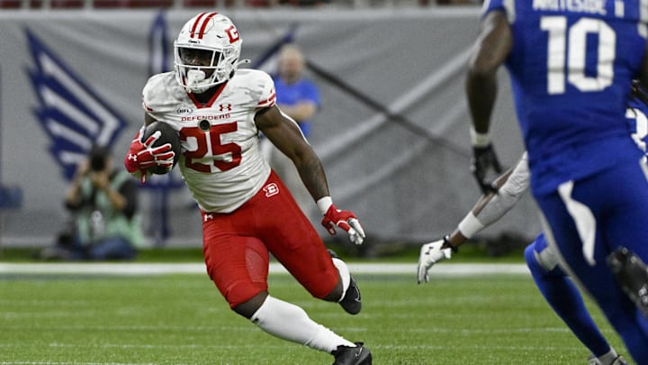 Jun 8, 2025; St. Louis, MO, USA; DC Defenders running back Deon Jackson (25) runs the ball against the St. Louis Battlehawks during the first quarter at The Dome at America’s Center.