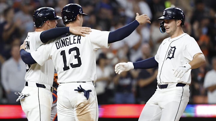 Aug 18, 2025; Detroit, Michigan, USA;  Detroit Tigers shortstop Trey Sweeney (27) celebrates with catcher Dillon Dingler (13) and first baseman Spencer Torkelson (20) after he hit a three run home run in the seventh inning against the Houston Astros at Comerica Park.