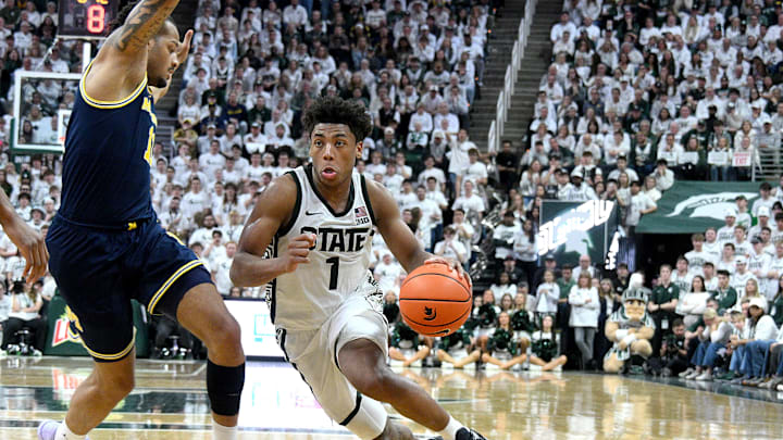 Jan 30, 2026; East Lansing, Michigan, USA; Michigan State Spartans guard Jeremy Fears Jr. (1) dribbles past Michigan Wolverines guard Roddy Gayle Jr. (11) during the second half at Jack Breslin Student Events Center. Mandatory Credit: Dale Young-Imagn Images Jan 30, 2026; East Lansing, Michigan, USA; Michigan State Spartans guard Jeremy Fears Jr. (1) dribbles past Michigan Wolverines guard Roddy Gayle Jr. (11) during the second half at Jack Breslin Student Events Center. Mandatory Credit: Dale Young-Imagn Images