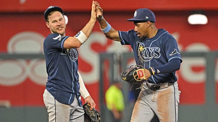 Jul 2, 2026; Kansas City, Missouri, USA;  Tampa Bay Rays left fielder Chandler Simpson (14) and shortstop Taylor Walls (6) celebrate after beating the Kansas City Royals at Kauffman Stadium. Mandatory Credit: Peter Aiken-Imagn Images