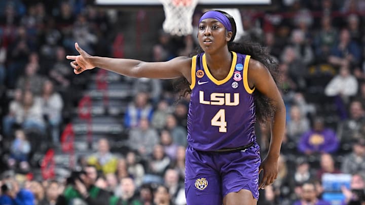 Mar 30, 2025; Spokane, WA, USA; LSU Lady Tigers guard Flau'Jae Johnson (4) reacts after play against the UCLA Bruins during the first half of a Elite 8 NCAA Tournament basketball game at Spokane Arena. Mandatory Credit: James Snook-Imagn Images Mar 30, 2025; Spokane, WA, USA; LSU Lady Tigers guard Flau'Jae Johnson (4) reacts after play against the UCLA Bruins during the first half of a Elite 8 NCAA Tournament basketball game at Spokane Arena. Mandatory Credit: James Snook-Imagn Images
