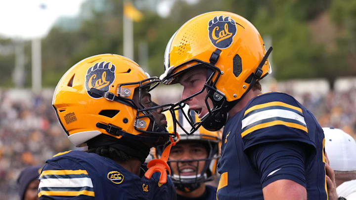 ReceiverJonathan Brady (left) and quarterback Fernando Mendoza after they hooked up on the game-winning touchdown pass. ReceiverJonathan Brady (left) and quarterback Fernando Mendoza after they hooked up on the game-winning touchdown pass.