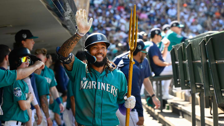 Jul 1, 2023; Seattle, Washington, USA; Seattle Mariners shortstop J.P. Crawford (3) waves to the TV camera while celebrating hitting a home run against the Tampa Bay Rays during the third inning at T-Mobile Park. Mandatory Credit: Steven Bisig-Imagn Images