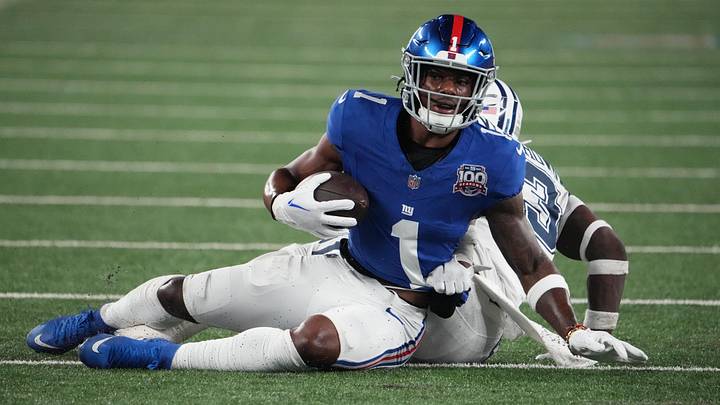 Sep 26, 2024; East Rutherford, New Jersey, USA; New York Giants wide receiver Malik Nabers (1) on a short gain against Dallas Cowboys linebacker DeMarvion Overshown (13) during the first half at MetLife Stadium. Mandatory Credit: Robert Deutsch-Imagn Images Sep 26, 2024; East Rutherford, New Jersey, USA; New York Giants wide receiver Malik Nabers (1) on a short gain against Dallas Cowboys linebacker DeMarvion Overshown (13) during the first half at MetLife Stadium. Mandatory Credit: Robert Deutsch-Imagn Images