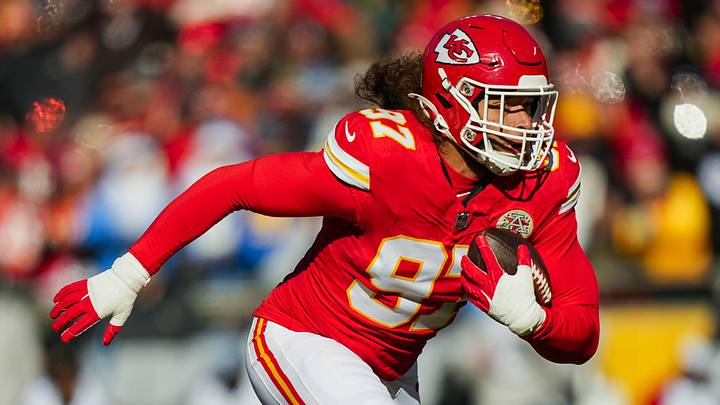 Dec 14, 2025; Kansas City, Missouri, USA; Kansas City Chiefs defensive end Ashton Gillotte (97) returns an interception during the first half against the Los Angeles Chargers at GEHA Field at Arrowhead Stadium. Mandatory Credit: Jay Biggerstaff-Imagn Images Dec 14, 2025; Kansas City, Missouri, USA; Kansas City Chiefs defensive end Ashton Gillotte (97) returns an interception during the first half against the Los Angeles Chargers at GEHA Field at Arrowhead Stadium. Mandatory Credit: Jay Biggerstaff-Imagn Images