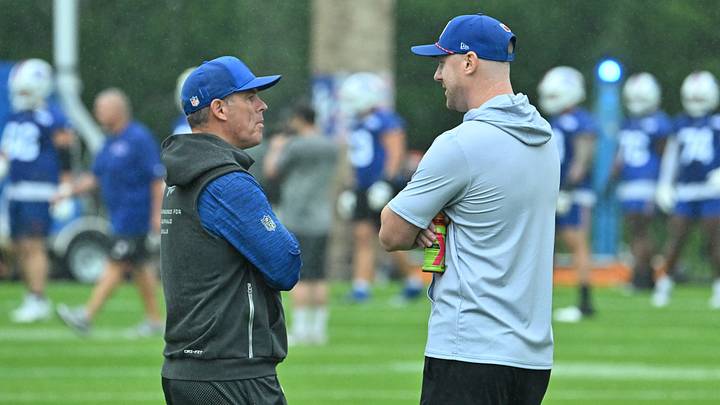 Buffalo Bills head coach Joe Brady (right) speaks with general manager Brandon Beane during training camp at St. John Fisher University Buffalo Bills head coach Joe Brady (right) speaks with general manager Brandon Beane during training camp at St. John Fisher University