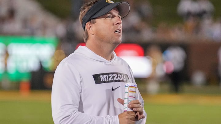 Sep 7, 2024; Columbia, Missouri, USA; Missouri Tigers head coach Eli Drinkwitz watches a replay against the Buffalo Bulls during the second half at Faurot Field at Memorial Stadium. Mandatory Credit: Denny Medley-Imagn Images