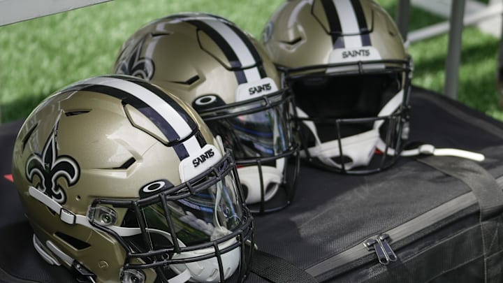 Sep 19, 2021; Charlotte, North Carolina, USA; New Orleans Saints helmets during the pregame action between the Carolina Panthers and the New Orleans Saints at Bank of America Stadium. Mandatory Credit: Jim Dedmon-Imagn Images