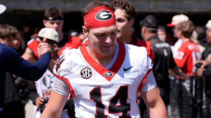 Georgia quarterback Gunner Stockton (14) arrives before the start of the Georgia G-Day spring football game in Athens, Ga., on Saturday, April 12, 2025.