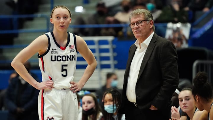 Feb 25, 2022; Hartford, Connecticut, USA; UConn Huskies head coach Geno Auriemma talks with guard Paige Bueckers (5) from the sideline as they take on the St. John's Red Storm in the second half at XL Center. Mandatory Credit: David Butler II-Imagn Images Feb 25, 2022; Hartford, Connecticut, USA; UConn Huskies head coach Geno Auriemma talks with guard Paige Bueckers (5) from the sideline as they take on the St. John's Red Storm in the second half at XL Center. Mandatory Credit: David Butler II-Imagn Images