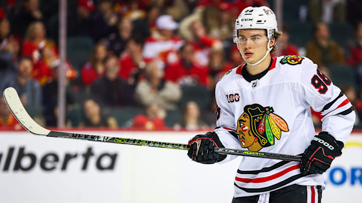 Nov 7, 2025; Calgary, Alberta, CAN; Chicago Blackhawks center Connor Bedard (98) during the face off against the Calgary Flames during the first period at Scotiabank Saddledome. Mandatory Credit: Sergei Belski-Imagn Images