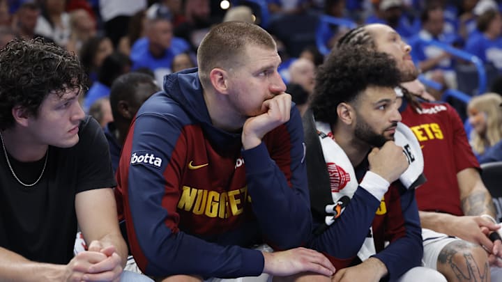 May 18, 2025; Oklahoma City, Oklahoma, USA; Denver Nuggets center Nikola Jokic (15) watches the game from the bench in the fourth quarter against the Oklahoma City Thunder in game seven of the second round for the 2025 NBA Playoffs at Paycom Center. Mandatory Credit: Alonzo Adams-Imagn Images