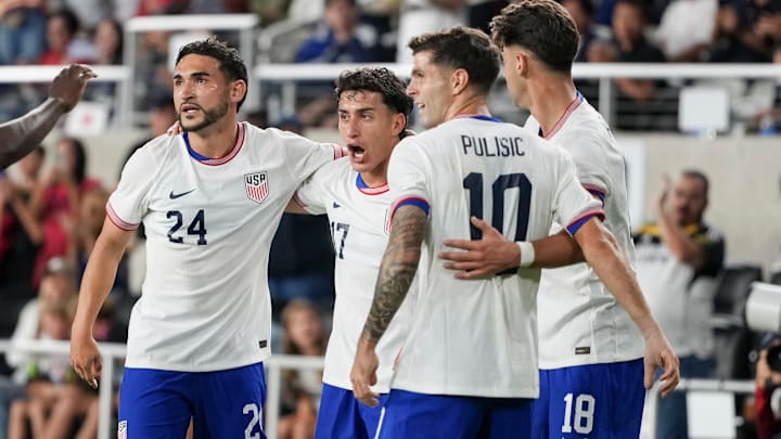 USMNT players celebrate a goal during a September friendly against Japan.