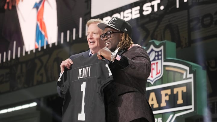 NFL Commissioner Rodger Goodell, left, with Boise State Broncos running back Ashton Jeanty is selected by the Las Vegas Raiders as the number six pick in the first round of the 2025 NFL Draft at Lambeau Field. Mark Hoffman / Milwaukee Journal Sentinel