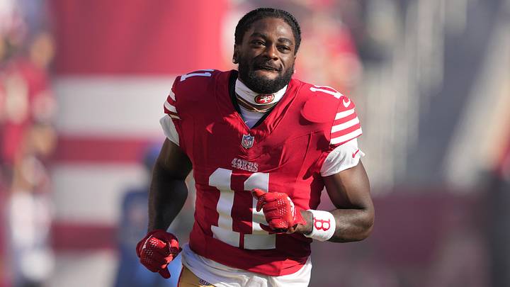 Sep 9, 2024; Santa Clara, California, USA; San Francisco 49ers wide receiver Brandon Aiyuk (11) is introduced to the crowd before the game against the New York Jets at Levi's Stadium. Mandatory Credit: Darren Yamashita-Imagn Images Sep 9, 2024; Santa Clara, California, USA; San Francisco 49ers wide receiver Brandon Aiyuk (11) is introduced to the crowd before the game against the New York Jets at Levi's Stadium. Mandatory Credit: Darren Yamashita-Imagn Images