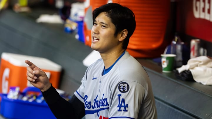 May 9, 2025; Phoenix, Arizona, USA; Los Angeles Dodgers designated hitter Shohei Ohtani reacts after scoring in the first inning against the Arizona Diamondbacks at Chase Field. Mandatory Credit: Mark J. Rebilas-Imagn Images May 9, 2025; Phoenix, Arizona, USA; Los Angeles Dodgers designated hitter Shohei Ohtani reacts after scoring in the first inning against the Arizona Diamondbacks at Chase Field. Mandatory Credit: Mark J. Rebilas-Imagn Images