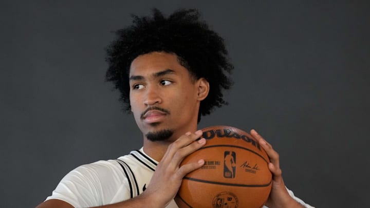 Sep 29, 2025; San Antonio, TX, USA; San Antonio Spurs guard Dylan Harper (2) poses for photos during Media Day at Victory Capital Performance Center in San Antonio. Sep 29, 2025; San Antonio, TX, USA; San Antonio Spurs guard Dylan Harper (2) poses for photos during Media Day at Victory Capital Performance Center in San Antonio.