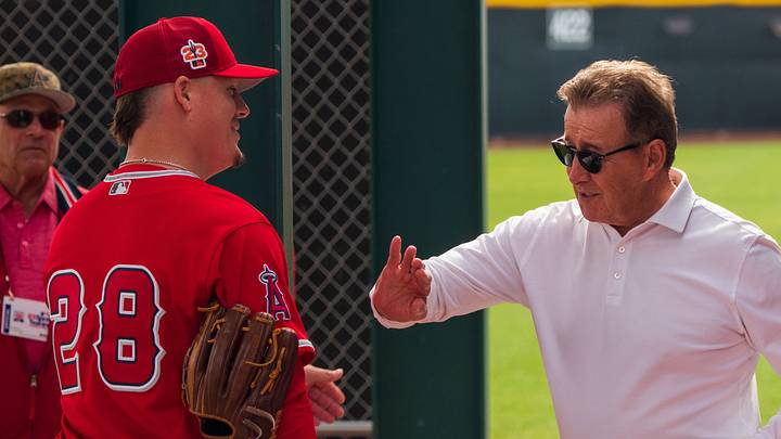 Feb 19, 2023; Tempe, AZ, USA; Los Angeles Angels team owner Arturo “Arte” Moreno (right) speaks with pitcher Aaron Loup (28) during spring training workout at Tempe Diablo Stadium. Mandatory Credit: Allan Henry-USA TODAY Sports Feb 19, 2023; Tempe, AZ, USA; Los Angeles Angels team owner Arturo “Arte” Moreno (right) speaks with pitcher Aaron Loup (28) during spring training workout at Tempe Diablo Stadium. Mandatory Credit: Allan Henry-USA TODAY Sports