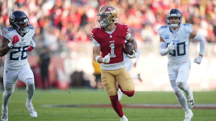 Dec 14, 2025; Santa Clara, California, USA;  San Francisco 49ers wide receiver Ricky Pearsall (1) runs with the ball during the third quarter against Tennessee Titans cornerback Marcus Harris (26) and linebacker Cody Barton (50)  at Levi's Stadium. Mandatory Credit: Cary Edmondson-Imagn Images