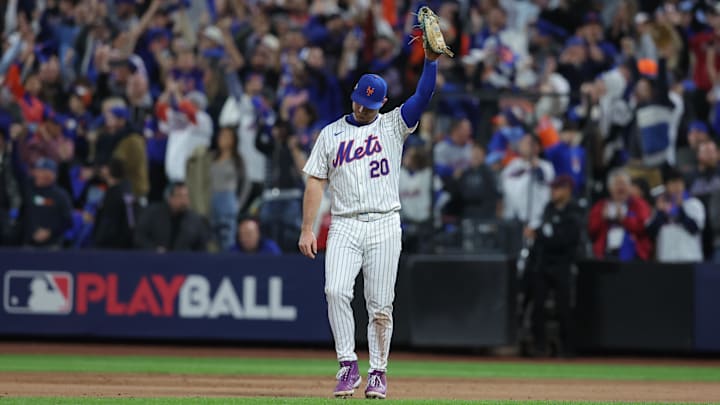 Oct 18, 2024; New York City, New York, USA; New York Mets first base Pete Alonso (20) celebrates defeating the Los Angeles Dodgers during game five of the NLCS for the 2024 MLB playoffs at Citi Field. Mandatory Credit: Brad Penner-Imagn Images Oct 18, 2024; New York City, New York, USA; New York Mets first base Pete Alonso (20) celebrates defeating the Los Angeles Dodgers during game five of the NLCS for the 2024 MLB playoffs at Citi Field. Mandatory Credit: Brad Penner-Imagn Images